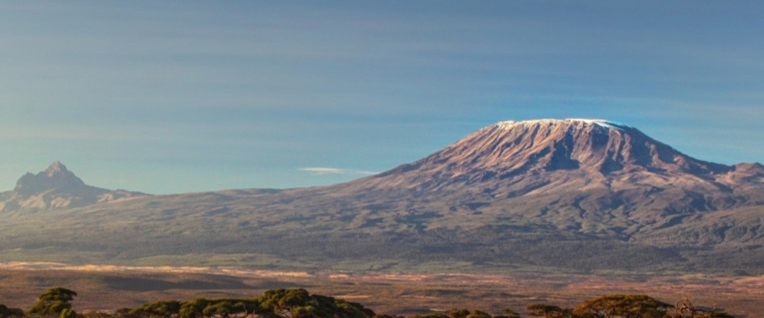 This image shows both peaks of Kibo on the right and Mawenzi. Both used to form the one single mountain before the last eruption, estimated to be 200,000 years ago.