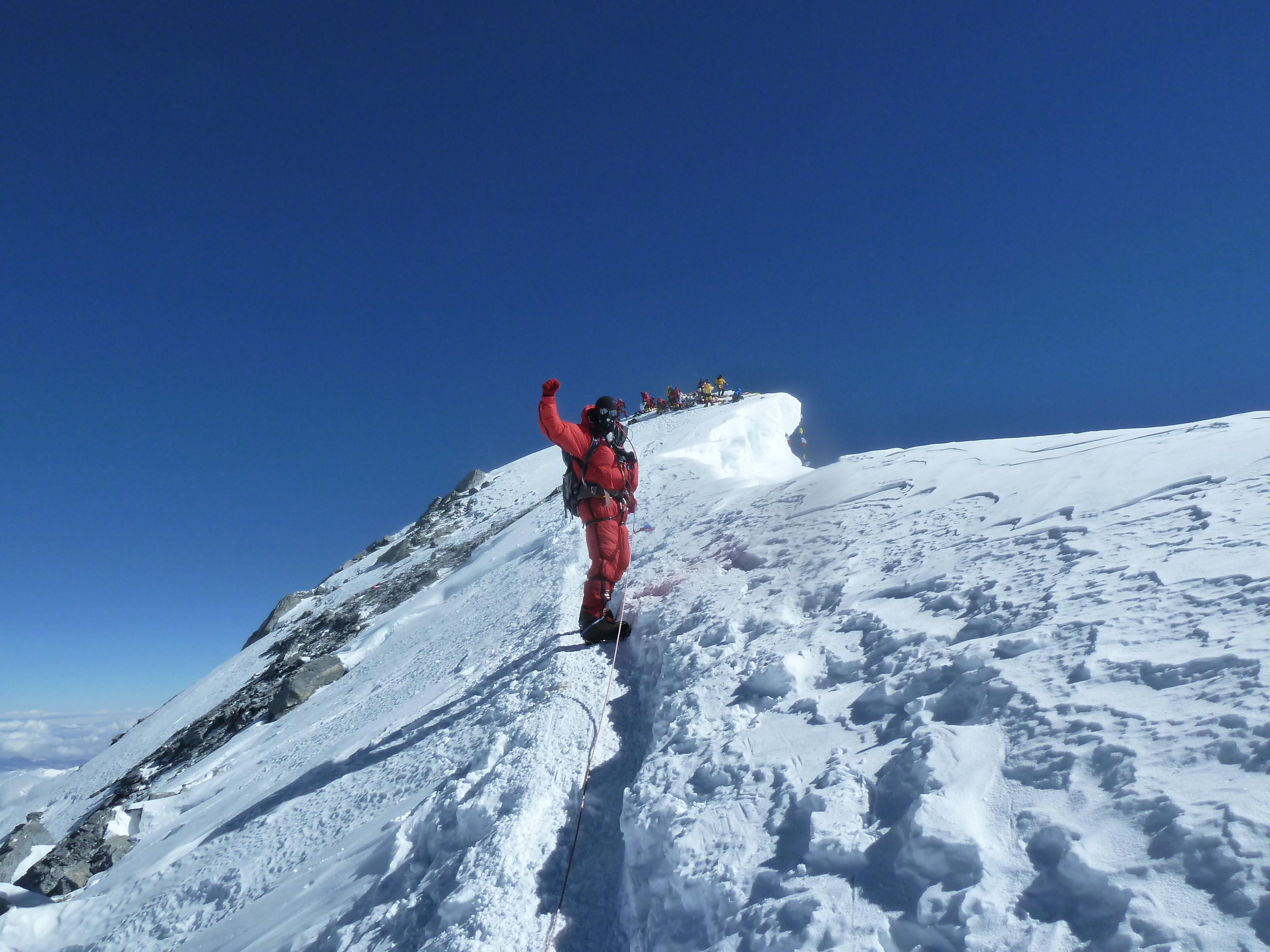 how many people climb everest each year