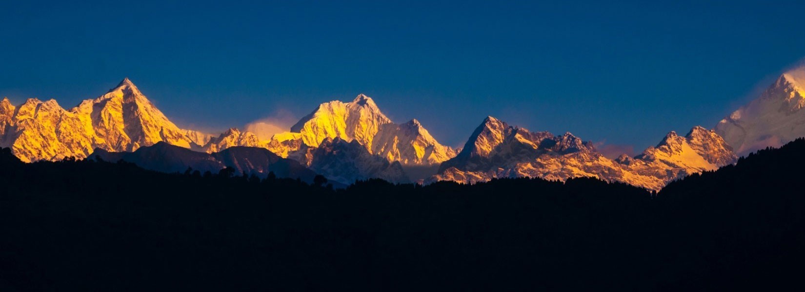 Panorama of Kanchenjunga massif at sunset