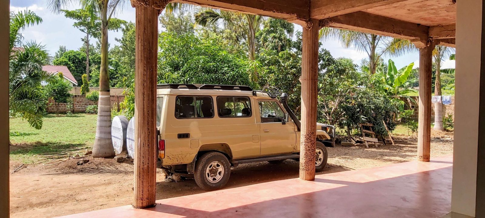 Adventure Alternative Tanzania 4WD in front of guesthouse in Moshi